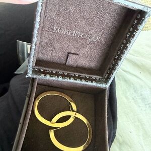 Roberto Coin Oval Flat Hoops. Yellow Gold